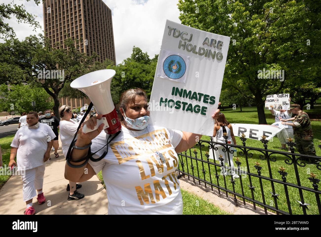 Austin, TX USA May 23, 2020: A coalition of Texas inmates rights groups rallies Saturday, May 23, 2020 at the Texas Governor's Mansion protesting the rapid spread of COVID-19 in prisons and the lack of protections for inmate during the pandemic. Hundreds of Texas inmates have tested positive and social distancing is impossible, critics say. Credit: Bob Daemmrich/Alamy Live News Stock Photo