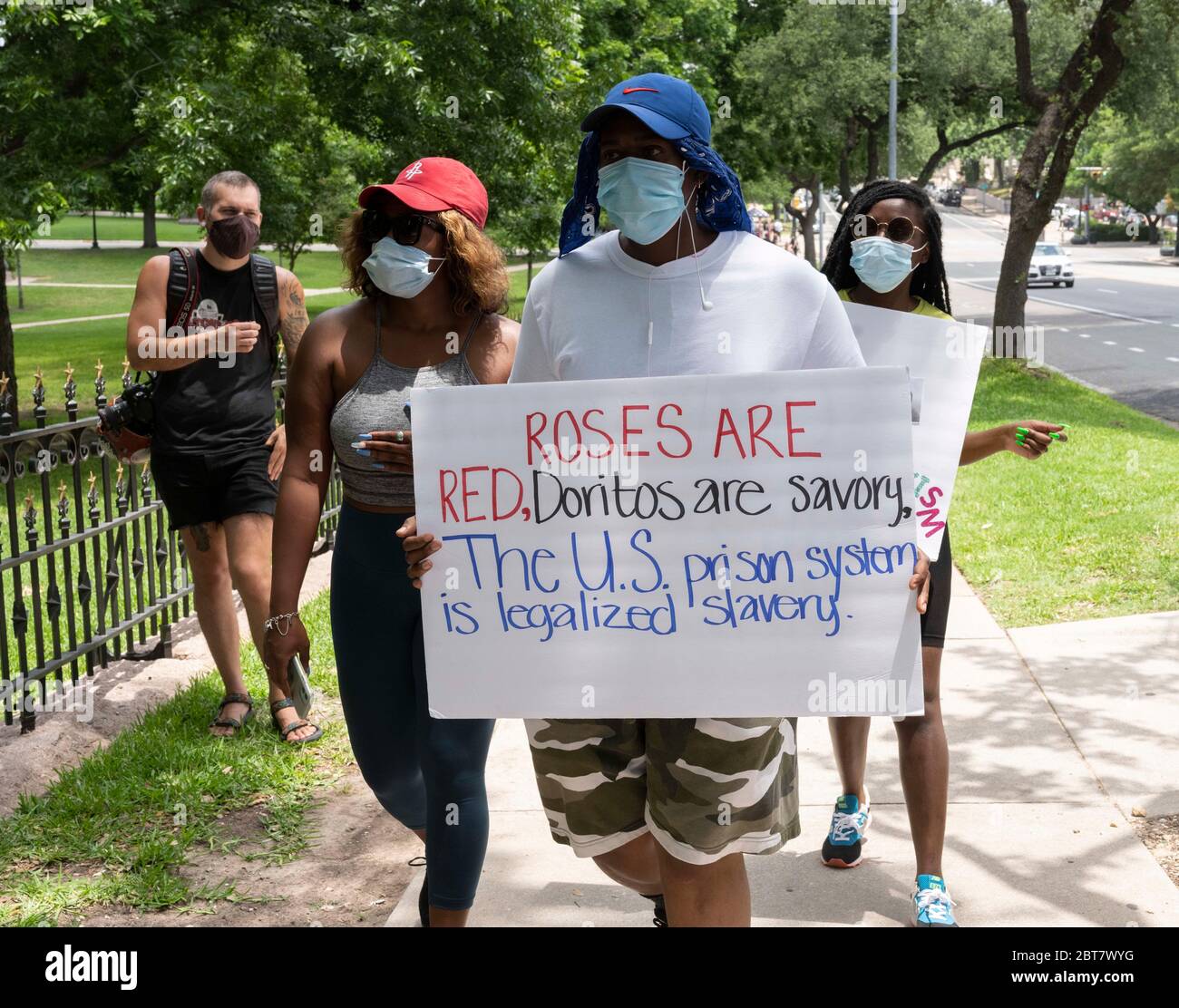 Austin, TX USA May 23, 2020: A coalition of Texas inmates rights groups rallies Saturday, May 23, 2020 at the Texas Governor's Mansion protesting the rapid spread of COVID-19 in prisons and the lack of protections for inmate during the pandemic. Hundreds of Texas inmates have tested positive and social distancing is impossible, critics say. Credit: Bob Daemmrich/Alamy Live News Stock Photo