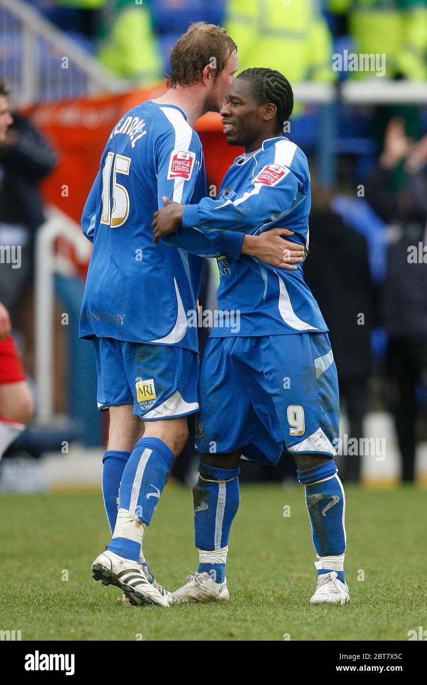 LONDON, UK MARCH 29: Peterborough's 2 goal scorers Aaron McLean and Scott Rendell congratulate each other at the end ofthe Coca Cola League Two betwee Stock Photo
