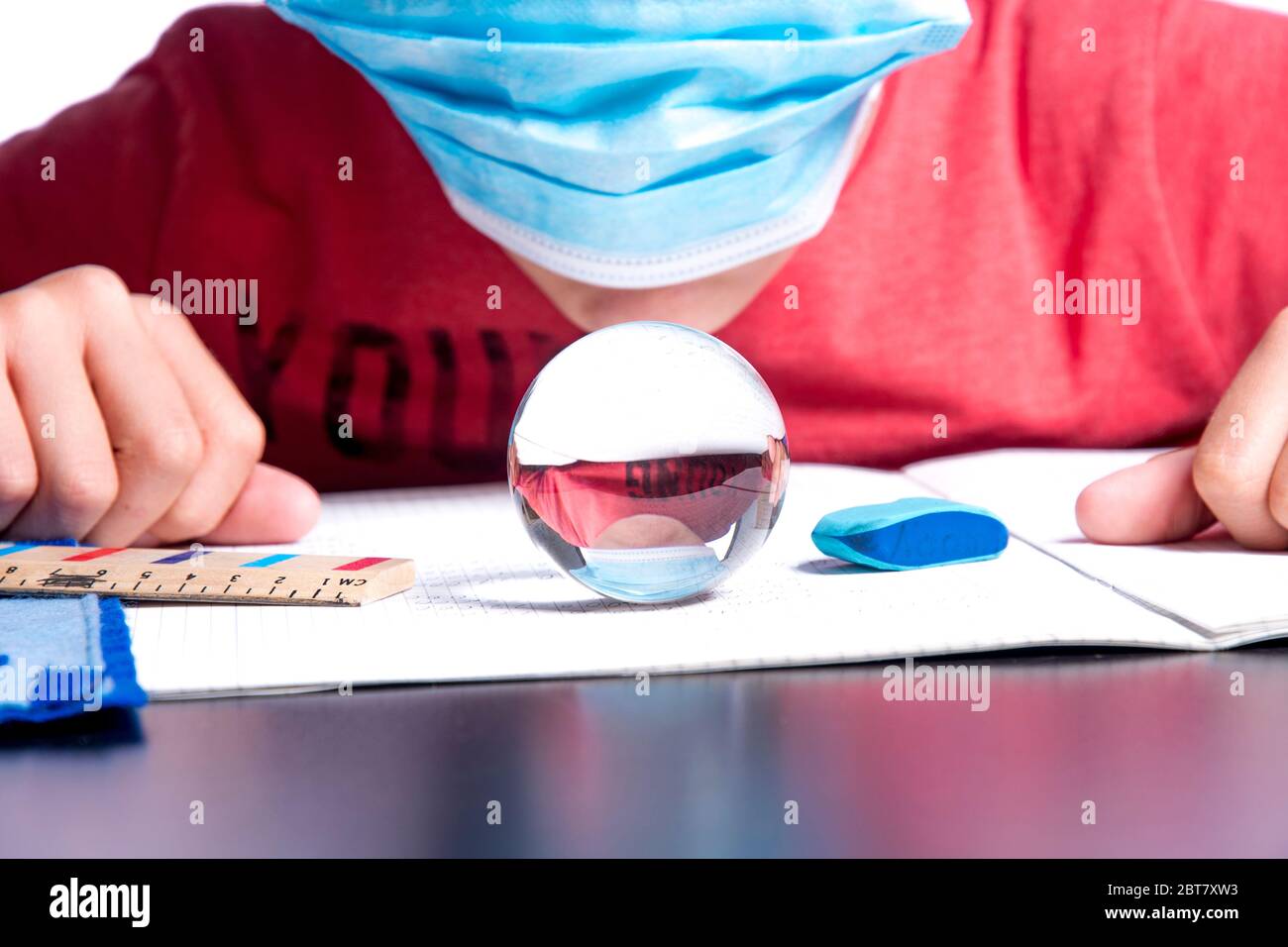 Crystal Ball Math Problem Student with crystal ball on his math notebook before the exam Stock ...