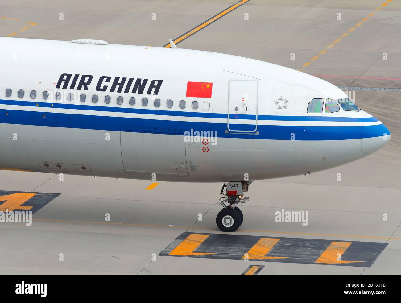 Air China Airbus A330 cabin close view showing logo and flag at Haneda Airport Tokyo Japan. B-5947 airplane. Chinese airline classic livery. Stock Photo