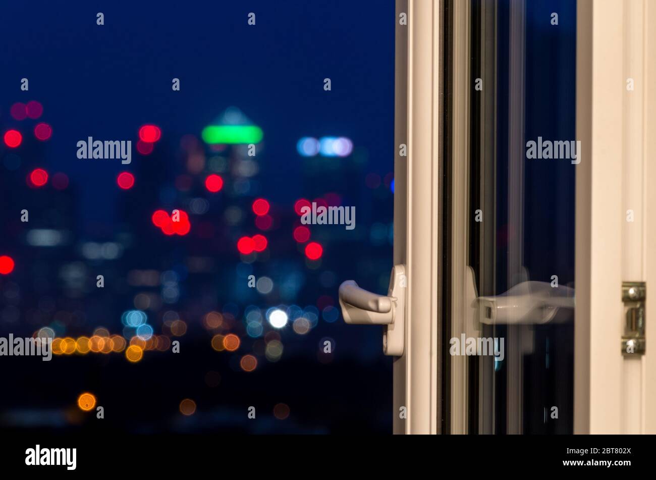 Blurred Canary Wharf skyline through the window Stock Photo