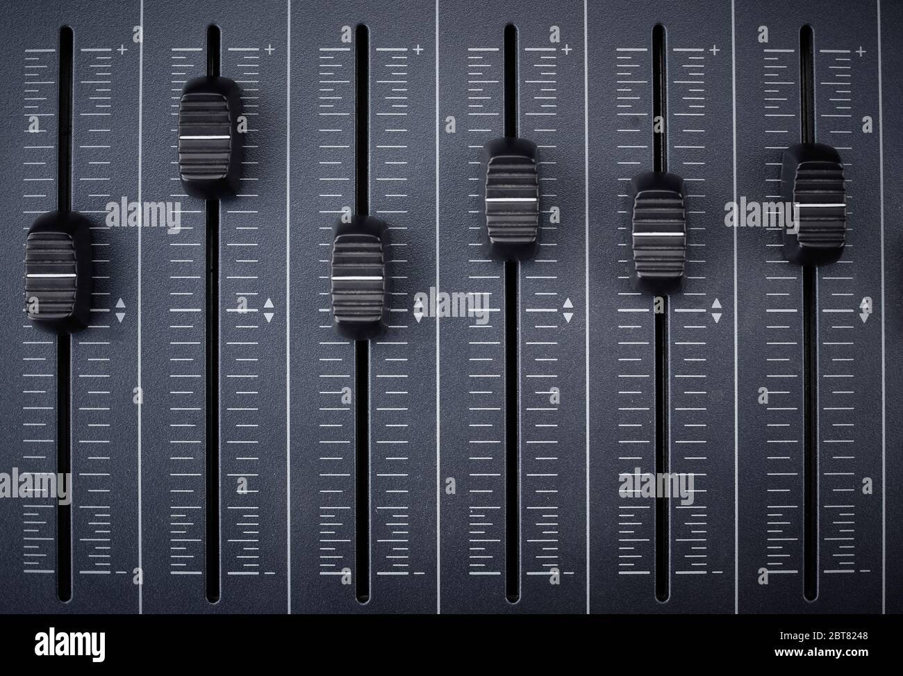 faders of a mixer for audio production and control of equalization and mixing using midi technology Stock Photo