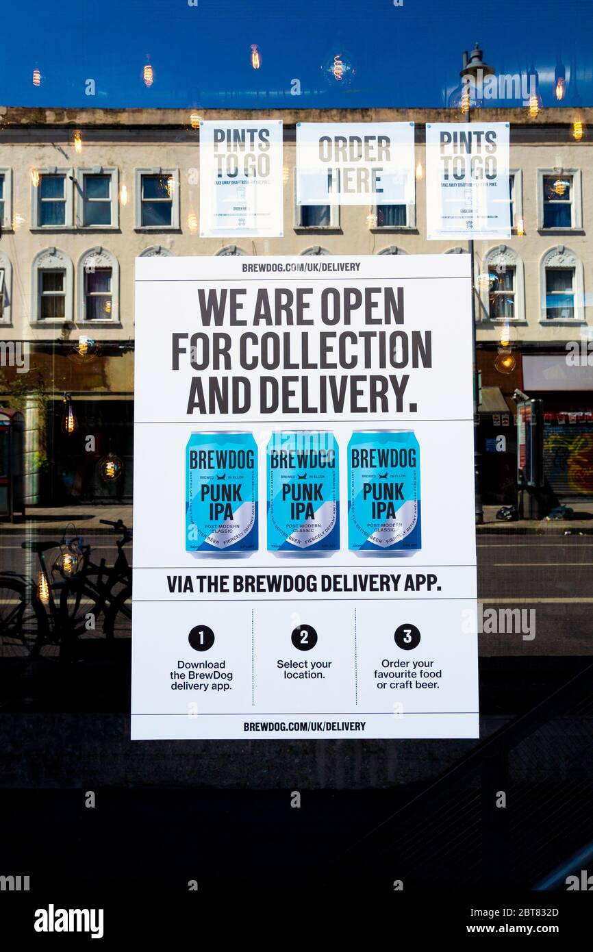 22 May 2020 London, UK - Sign in the BrewDog Dalston pub offering pints to go during the Coronavirus pandemic lockdown Stock Photo