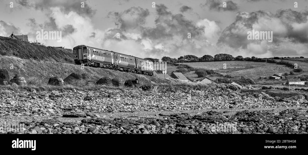 Northern Rail class 153 + 156 passing Mossbay, Workington on the