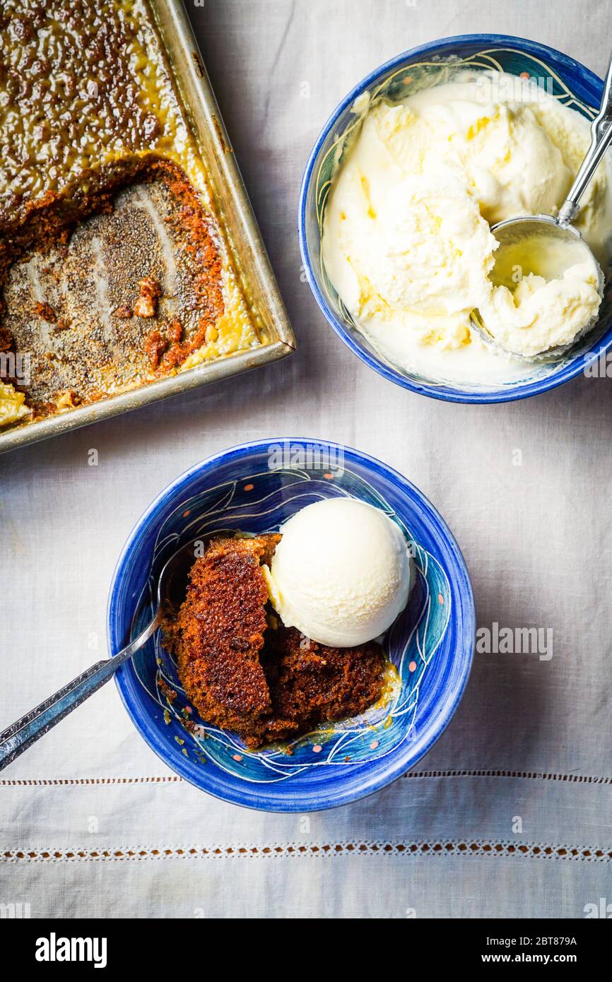 Sticky Toffee Pudding with Vanilla Ice Cream Stock Photo Alamy