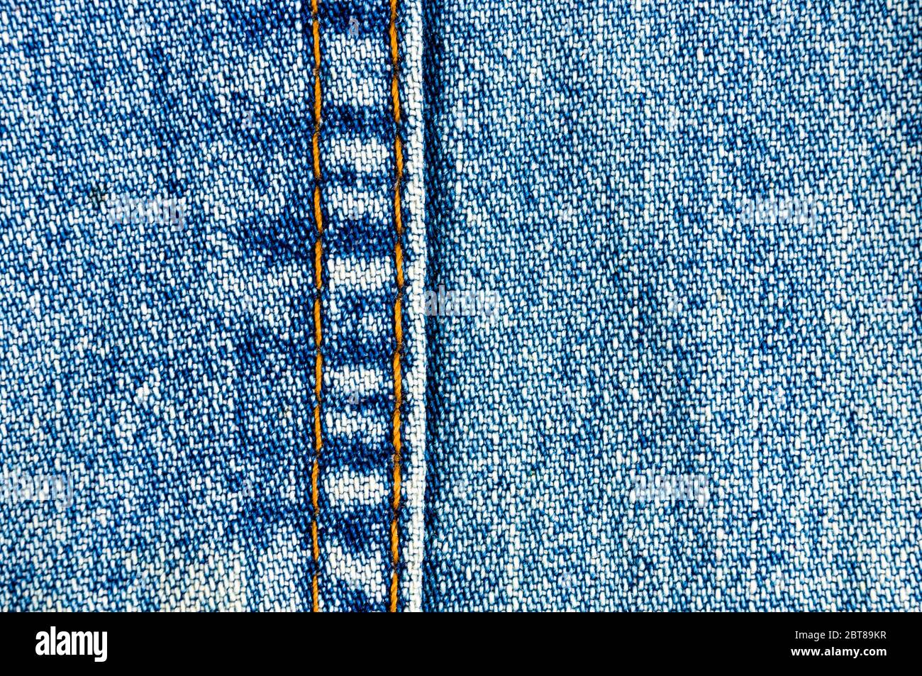 clothing items washed cotton fabric texture with seams, clasps, buttons and  rivets, macro, close-up Stock Photo - Alamy