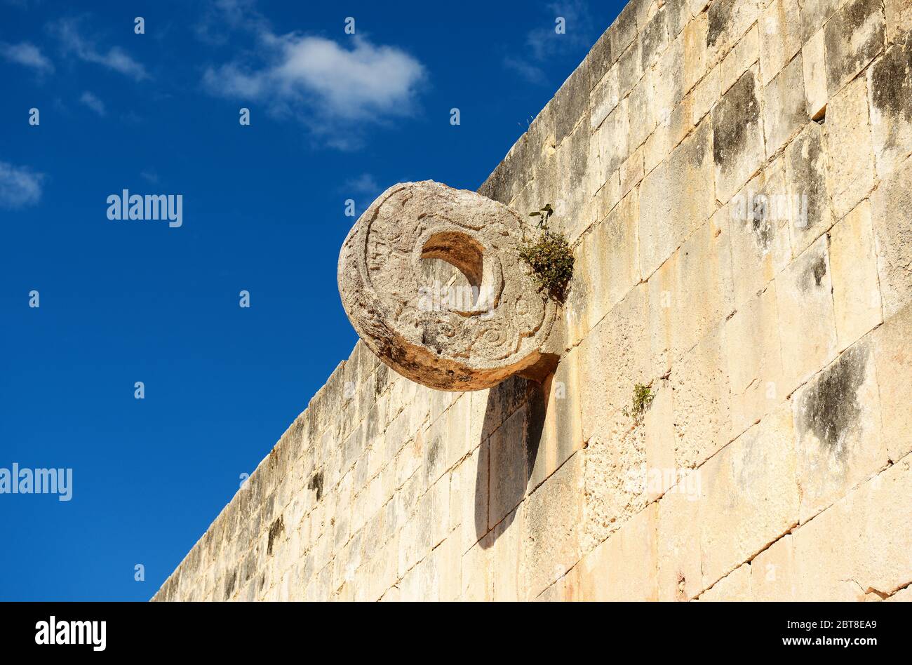 A stone ballcourt goal or ring used by the ancient maya to play the mesoamerican ball game, Chichen Itza Mayan Ruin, Yucatan, Mexico. Stock Photo