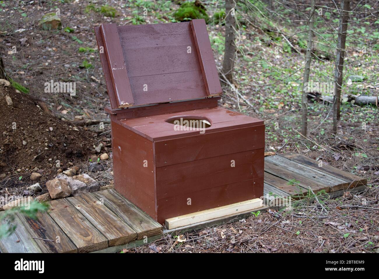 An open air privy at a primitive campsite in the Adirondack Mountains, NY USA wilderness. Stock Photo