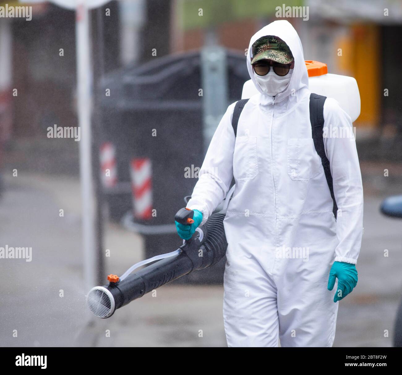 Bogota, Colombia. 23rd May, 2020. Soldiers from the Military Police Battalion during a cleaning, disinfection and spraying session in the La Mariposa Mariposa sector to counter the spread of the corona virus, COVID 19 Credit: Daniel Garzon Herazo/ZUMA Wire/Alamy Live News Stock Photo