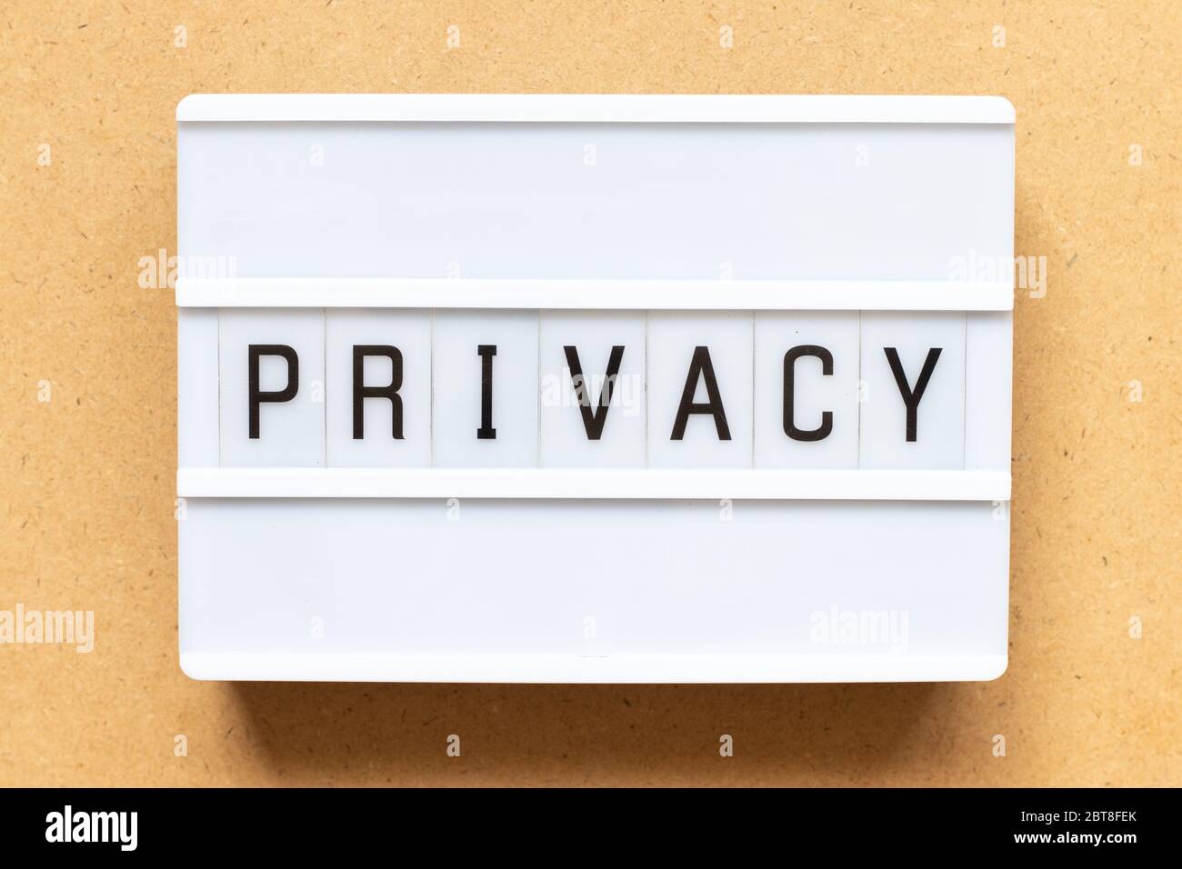 Lightbox with word privacy on wood background Stock Photo