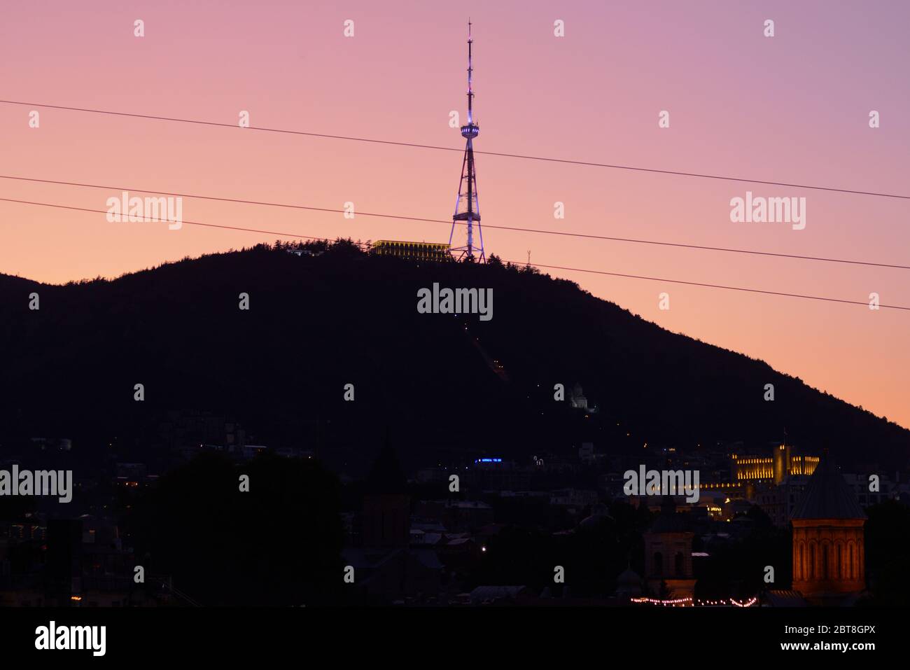 Tbilisi: Mount Mtatsminda  and TV Broadcasting Tower at sunset. Republic of Georgia Stock Photo