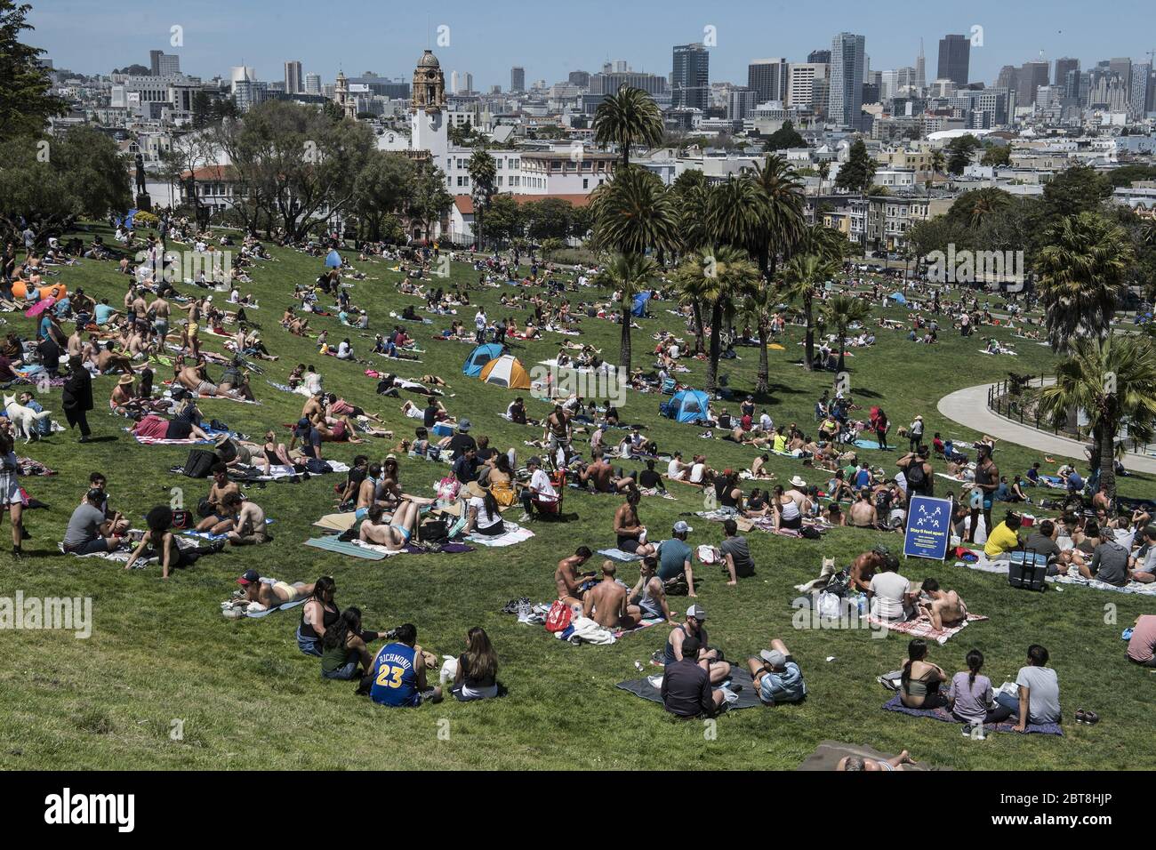 San Francisco, United States. 24th May, 2020. Groups cover the grass in Delores Park in San Francisco on Saturday, May 23, 2020. Warm weather and a holiday weekend brought out thousands to practice their own brands of social distancing. Photo by Terry Schmitt/U10 Credit: UPI/Alamy Live News Stock Photo