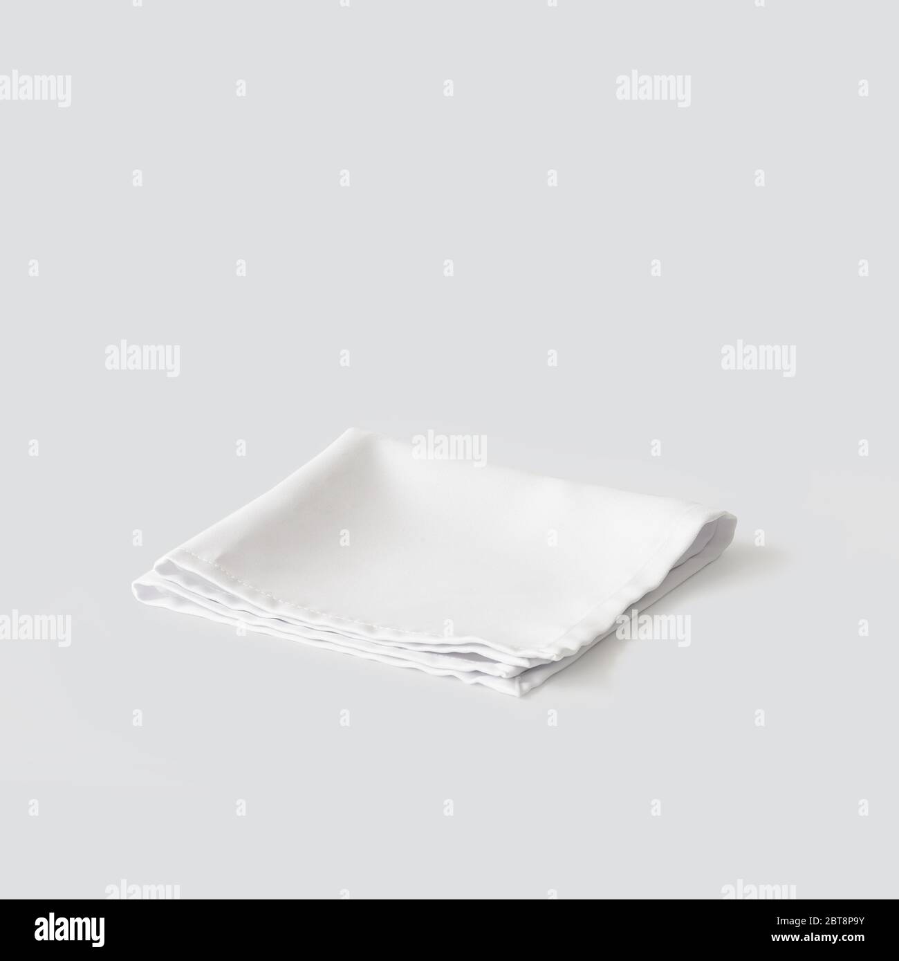 white napkin isolated on light grey background Stock Photo