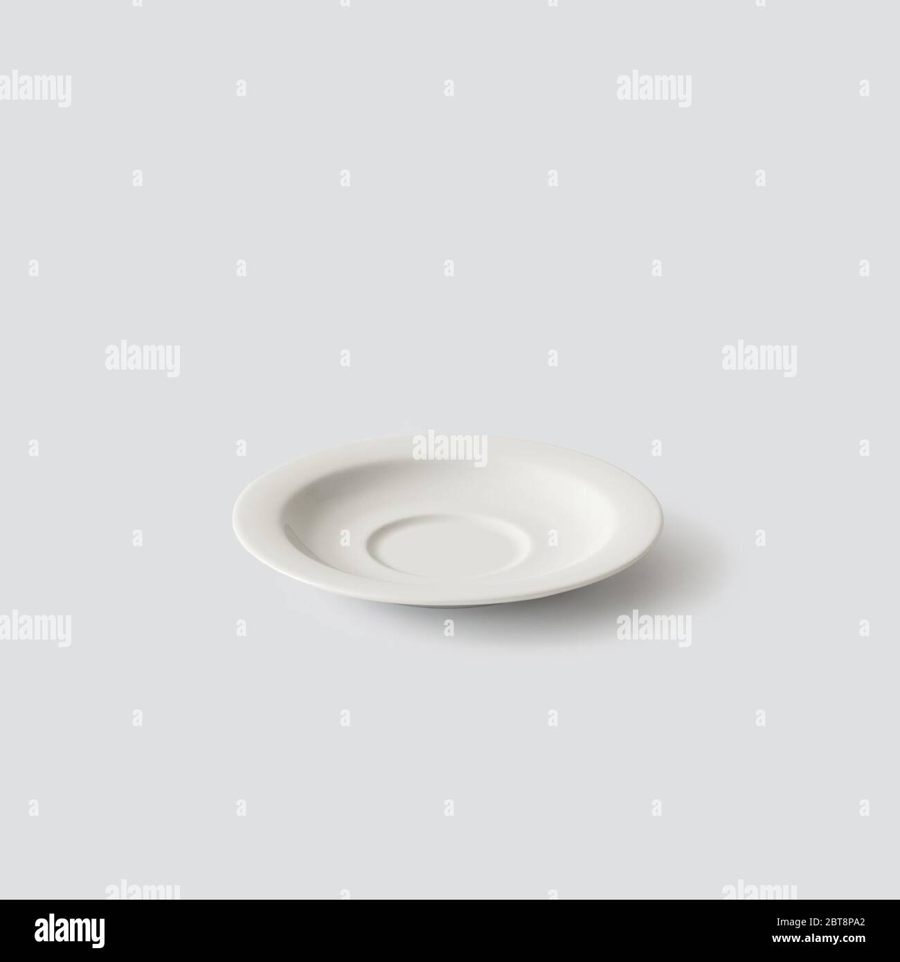 empty white plate isolated on light grey background Stock Photo