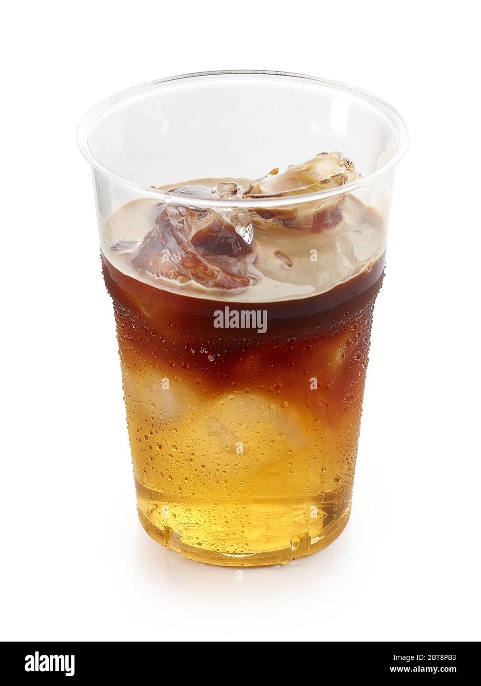 iced layered coffee drink in plastic cup isolated on white background