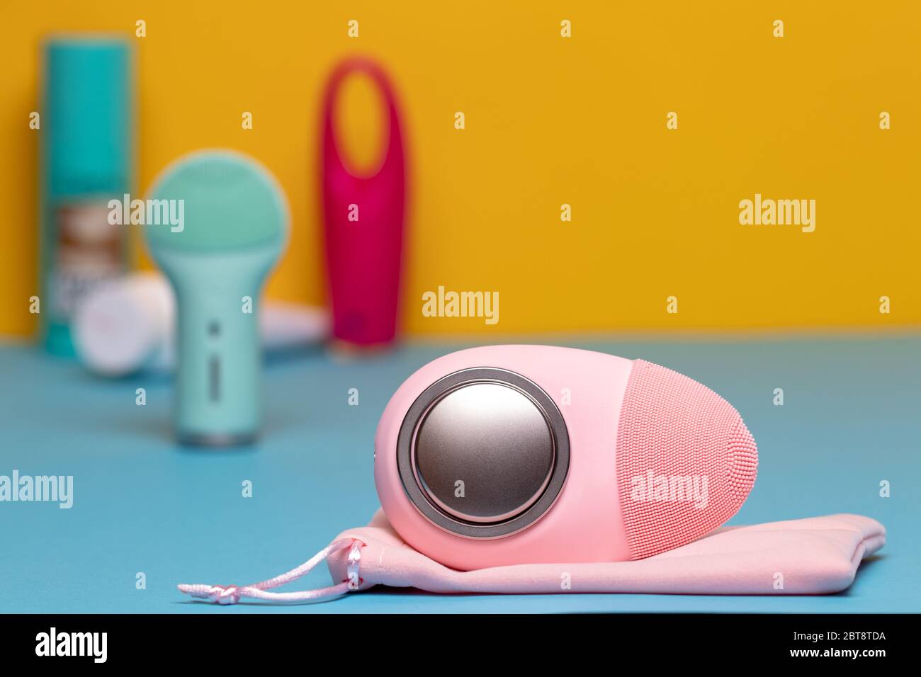 Beauty and skincare concept. Selective focus on a modern pink electric