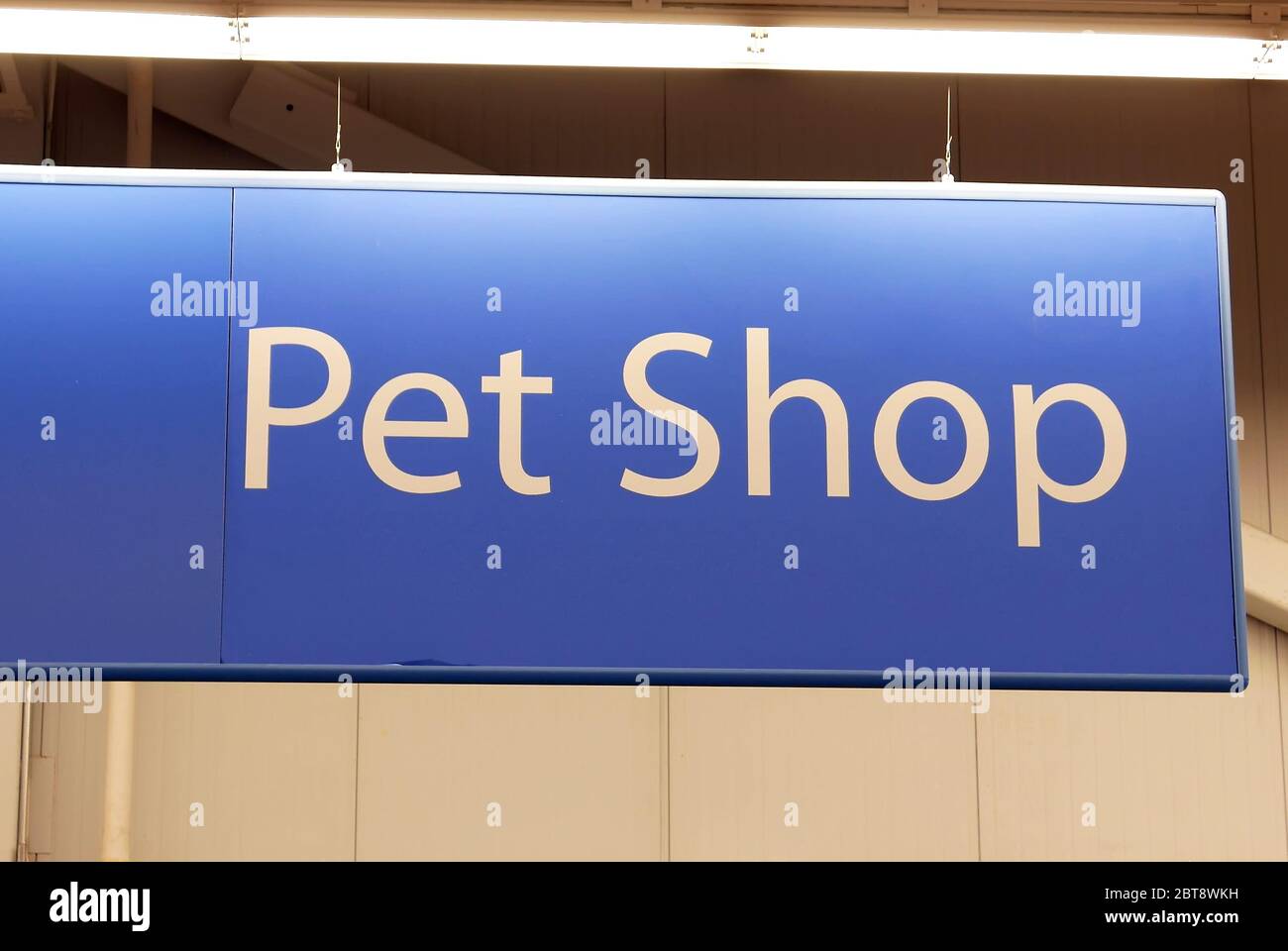 Motion of pet shop sign on top inside Walmart store Stock Photo