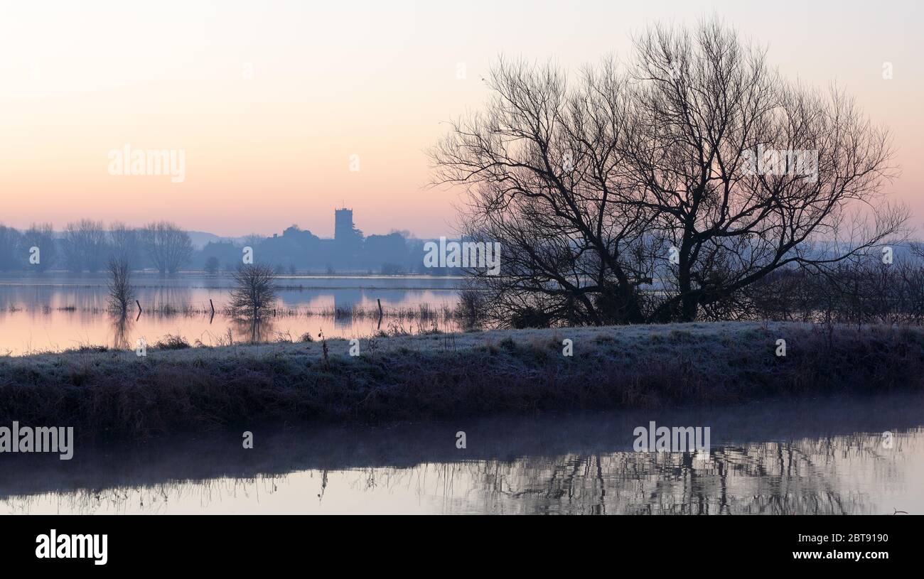View to Muchelney of flooded river parrot near Langport Stock Photo