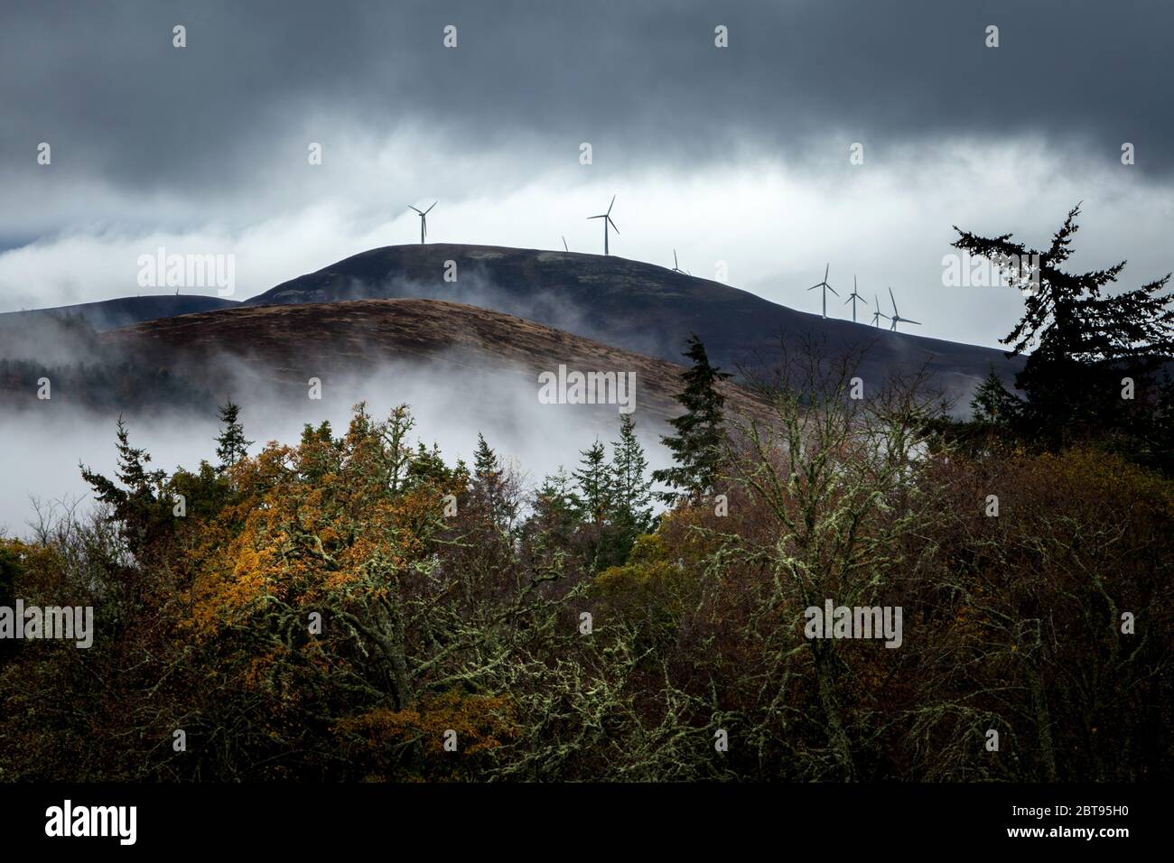 Mist, Wind Turbines, Strath Rusdale,  Highlands, Scotland Stock Photo