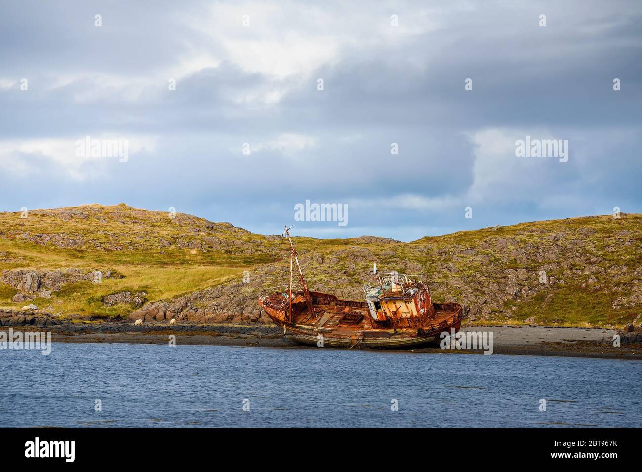 Fishing ship wreck laying on the Snaefellsnes peninsula in Iceland Stock Photo