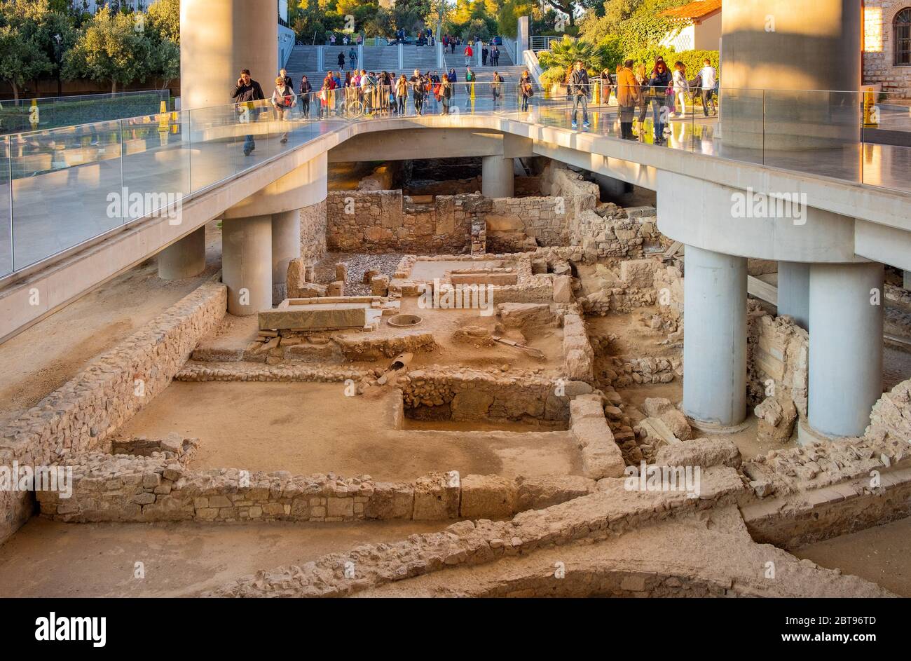 Athens, Attica / Greece - 2018/03/30: Archeological excavation site under main entrance to Acropolis Museum - Mouseio Akropolis - in ancient old town Stock Photo