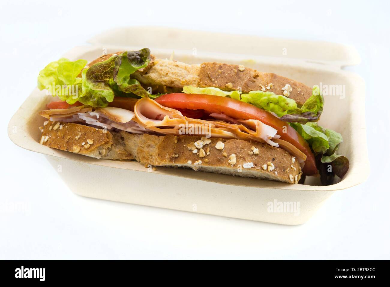 Sandwich of tomato, lettuce and smoked turkey Stock Photo