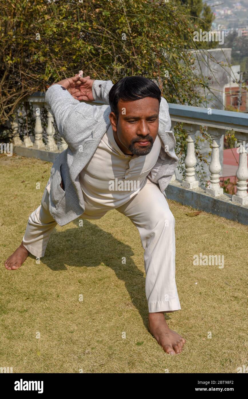 Kathmandu, Nepal - 2 February 2020: yoga position performed by a teacher at Kathmandu on Nepal Stock Photo