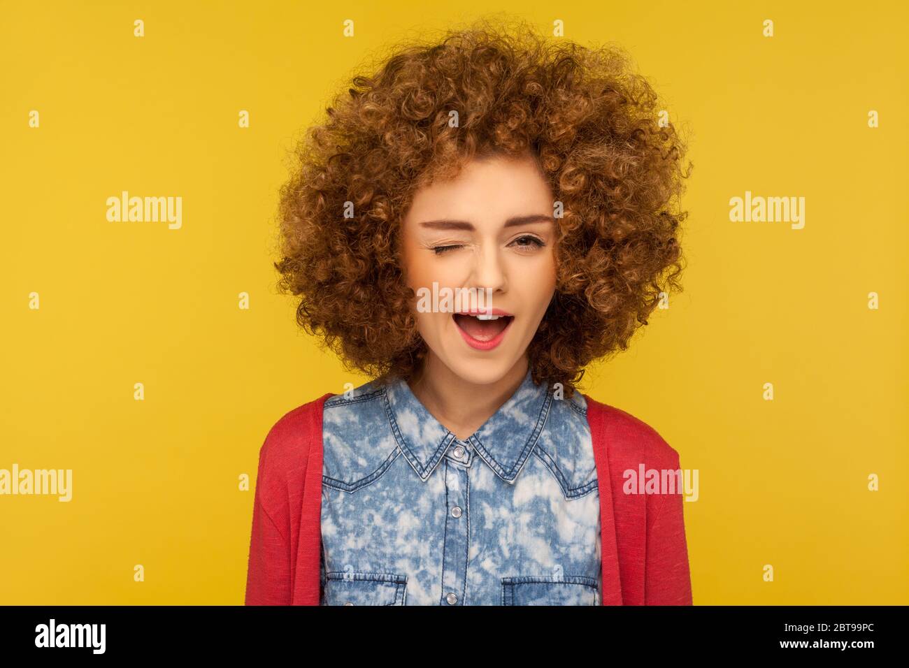 Closeup portrait of playful happy charming woman with curly hair in ...