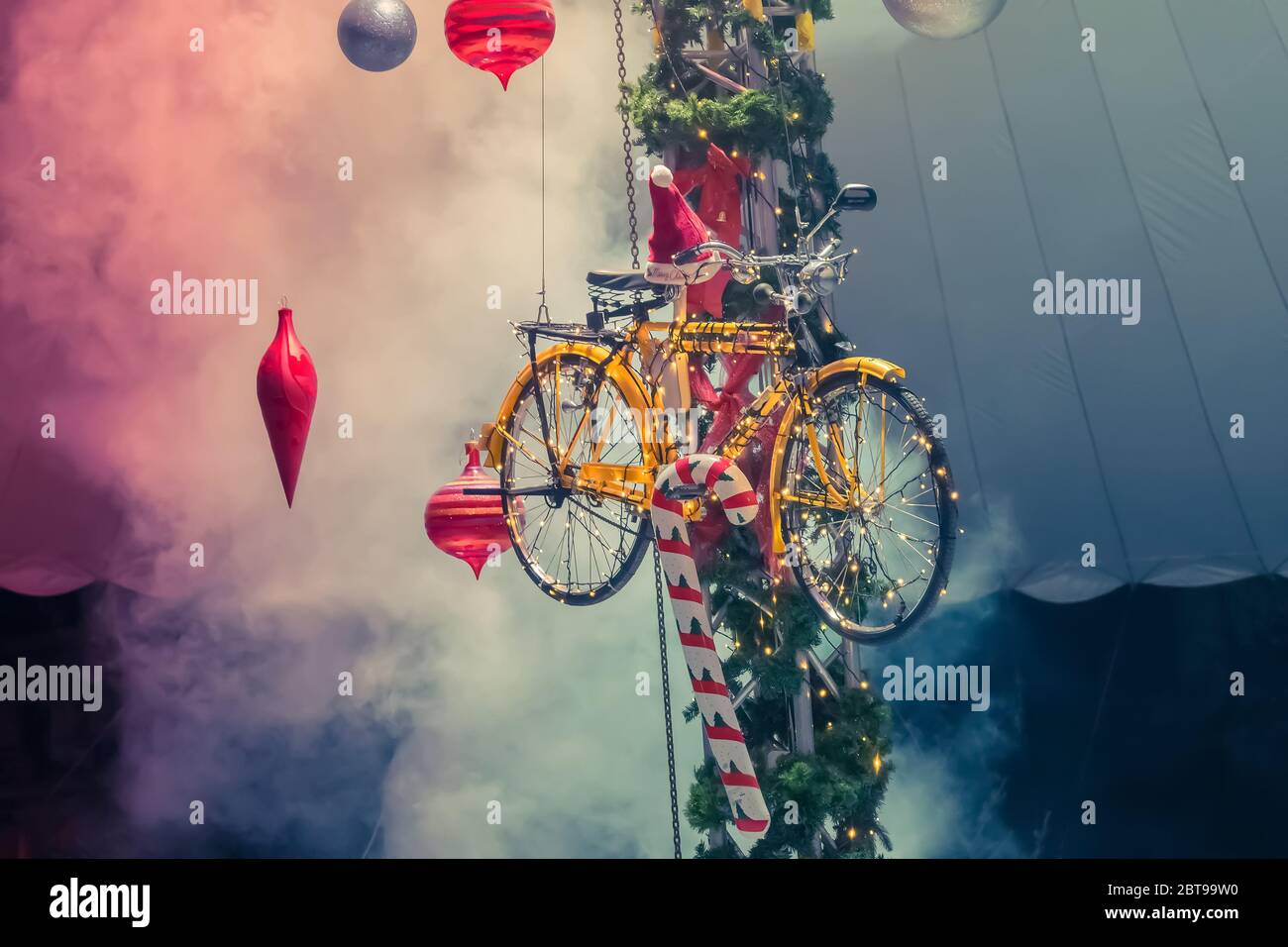 Christmas bicycle decoration with smoke as background Stock Photo - Alamy