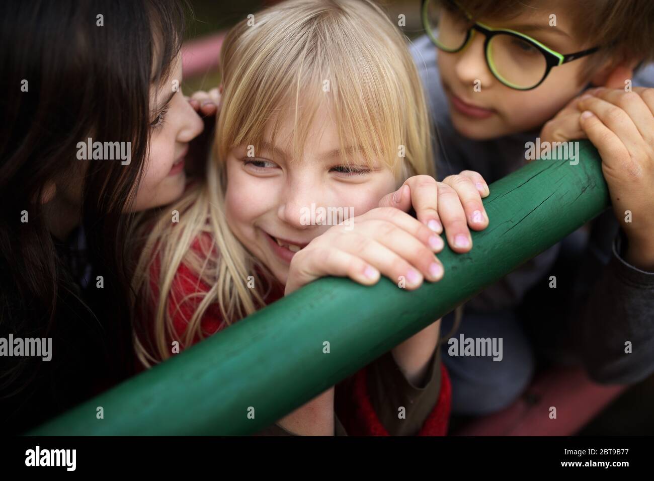 young friends have a nice time together while playing outside Stock Photo