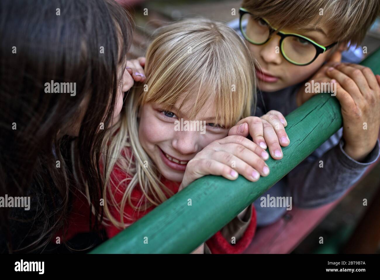 young friends have a nice time together while playing outside Stock Photo