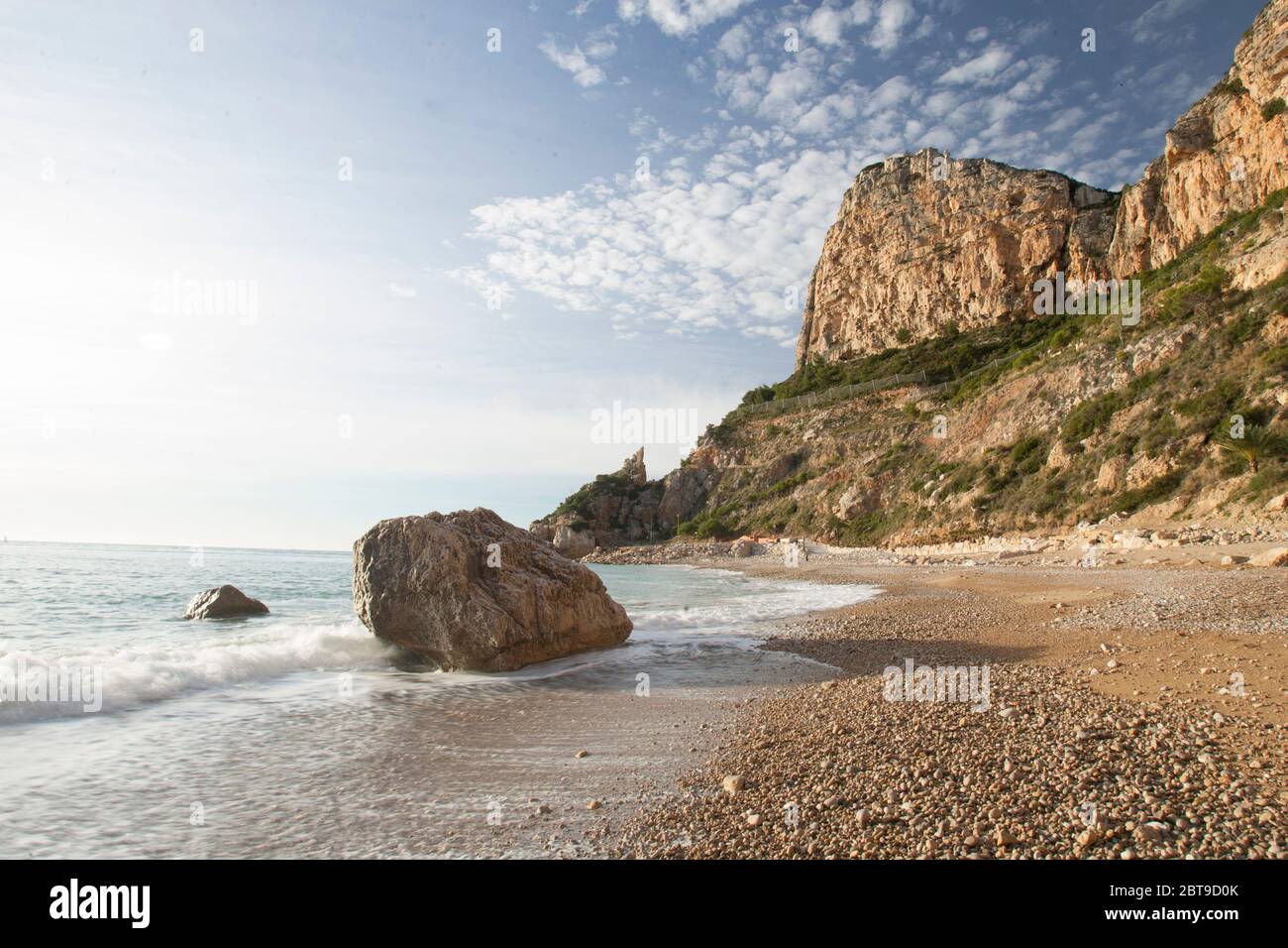 Waves reaching the beach. Stock Photo