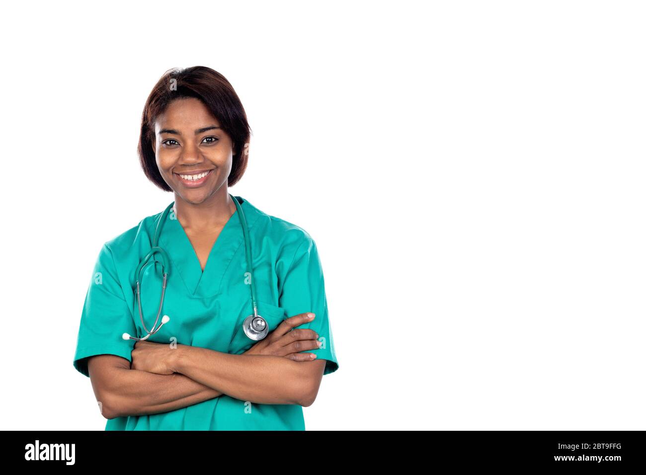 Doctor with green uniform isolated on a white background Stock Photo