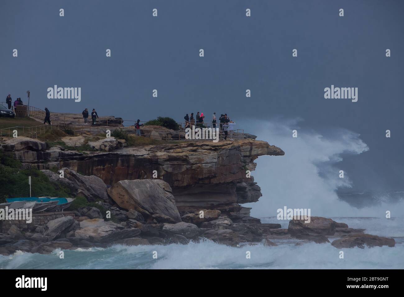 Sydney, Australia. Sunday 24th May 2020. Bondi Beach in Sydney's Eastern suburbs experiences very rough surf conditions today with  massive waves. People seen watching the rough surf conditions at Ben Buckler Point, Bondi. Credit Paul Lovelace/Alamy Live News Stock Photo