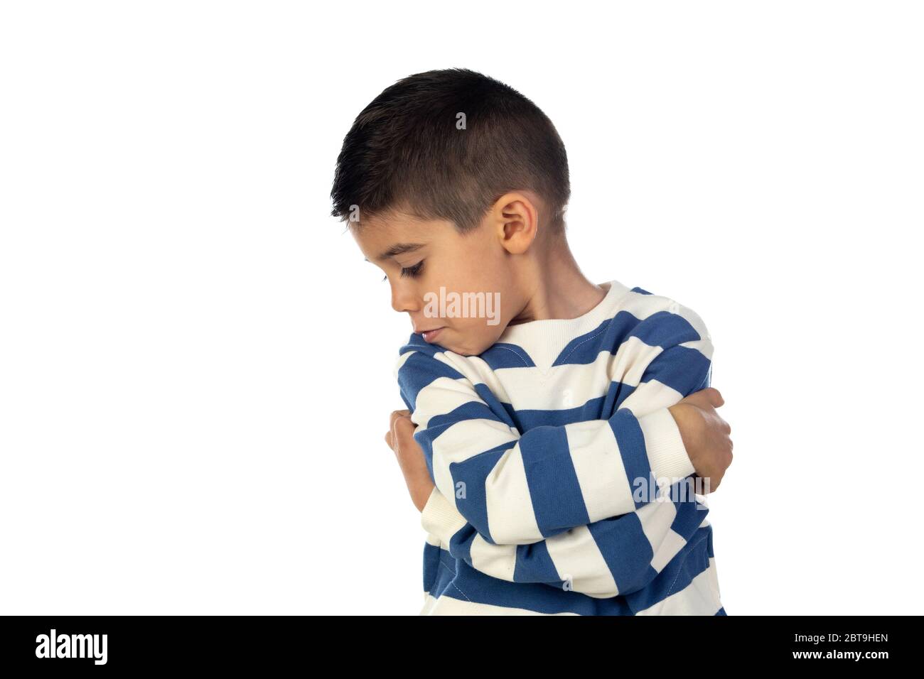 Sad latin child isolated on a white background Stock Photo