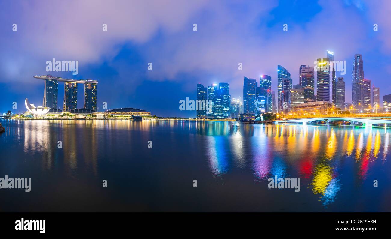 Singapore skyline at the Marina during twilight. Stock Photo