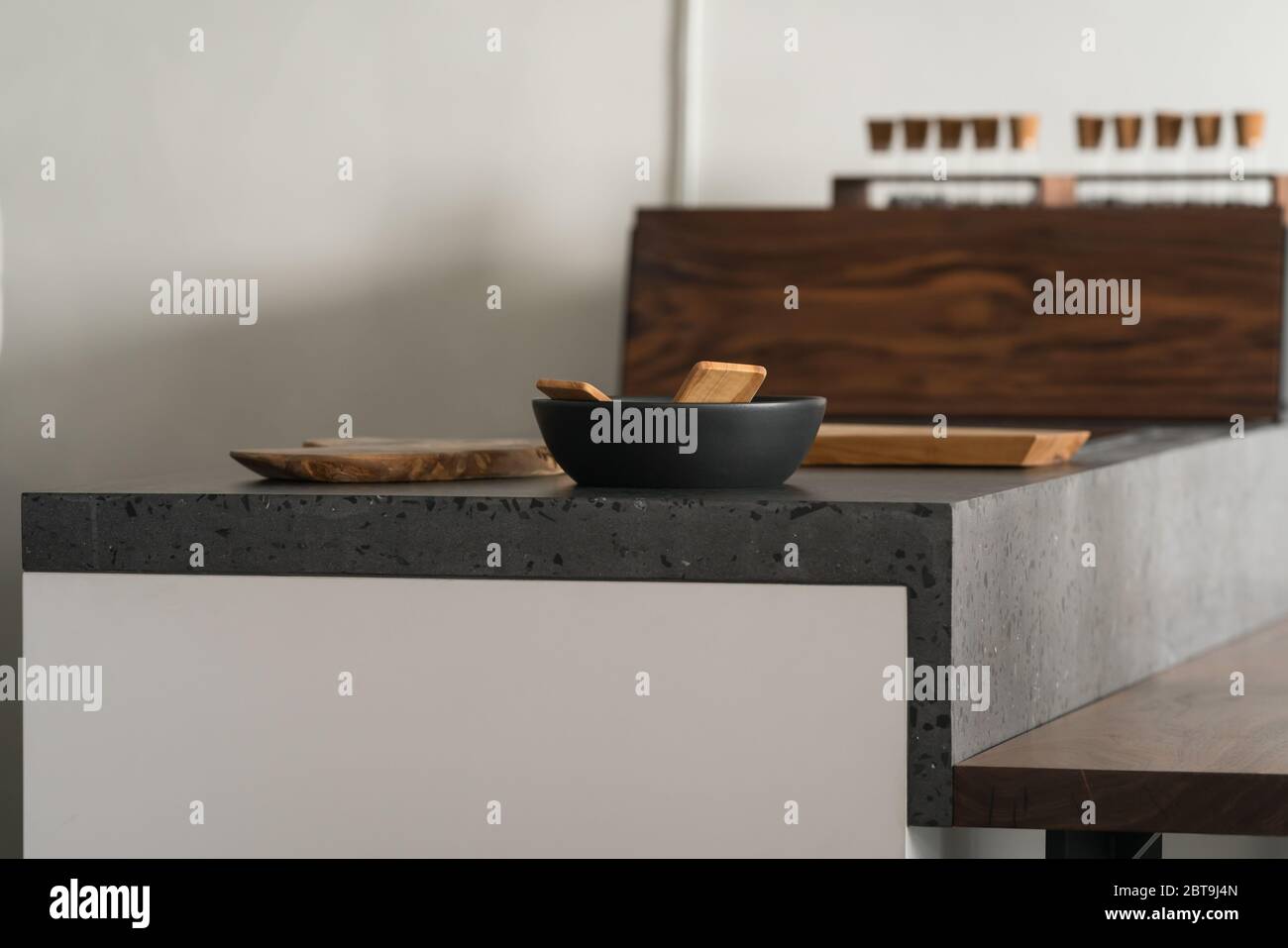 Modern minimalistic kitchen interior with concrete terrazzo countertop Stock Photo