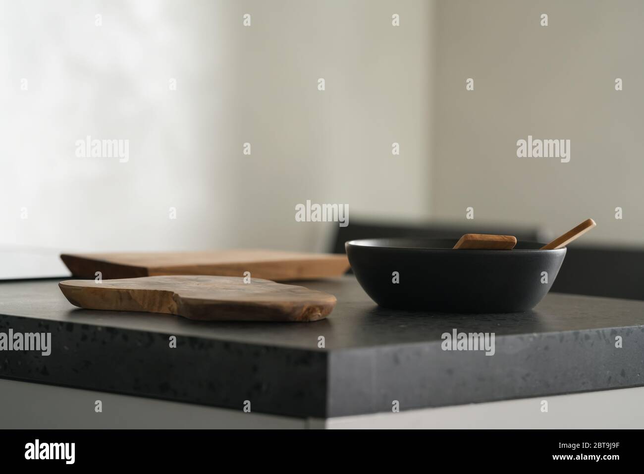 Modern minimalistic kitchen interior with concrete terrazzo countertop Stock Photo
