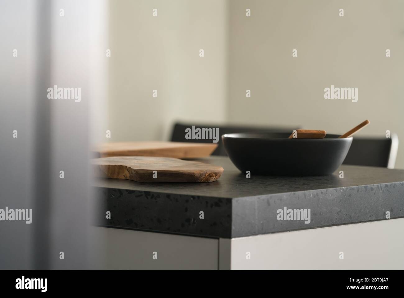 Modern minimalistic kitchen interior with concrete terrazzo countertop Stock Photo