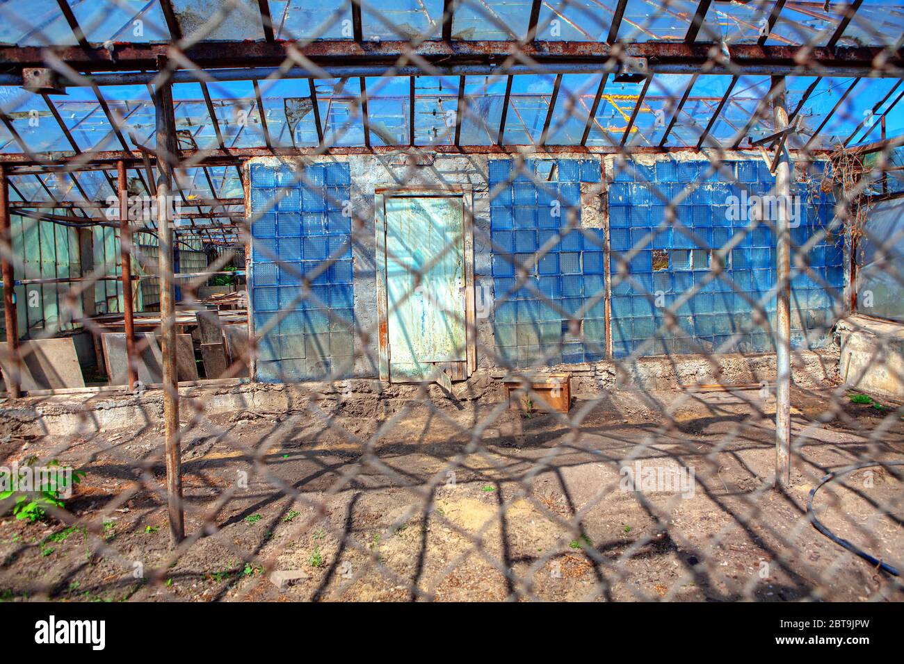 abandoned agricultural shed , old nonfunctional greenhouse Stock Photo