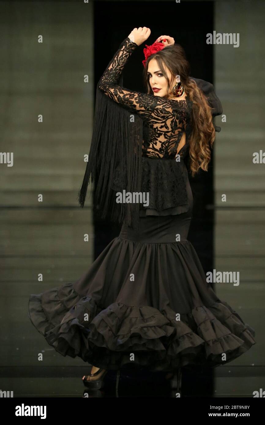 SEVILLA, SPAIN - JAN 31: Singer Amor Romeira wearing a dress from the Dualismo collection by designer Adelina Infante as part of the SIMOF 2020 (Photo credit: Mickael Chavet) Stock Photo