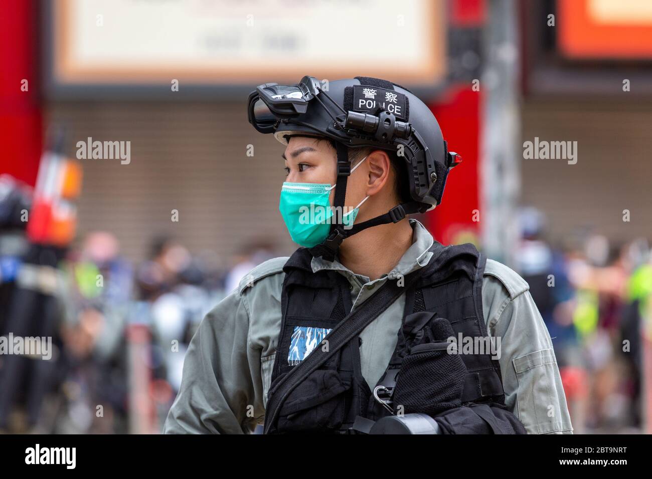 Hong Kong, 24th May 2020. .Female HK Police officer. Credit: David Ogg / Alamy Live News Stock Photo