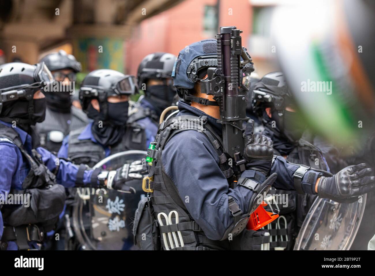 Hong Kong, 24th May 2020. Armed HK Police Officer.Credit: David Ogg / Alamy Live News Stock Photo