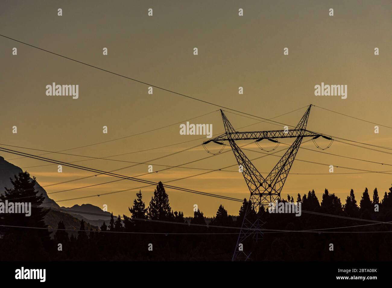Scene view high voltage power lines silhouette at sunset Stock Photo ...
