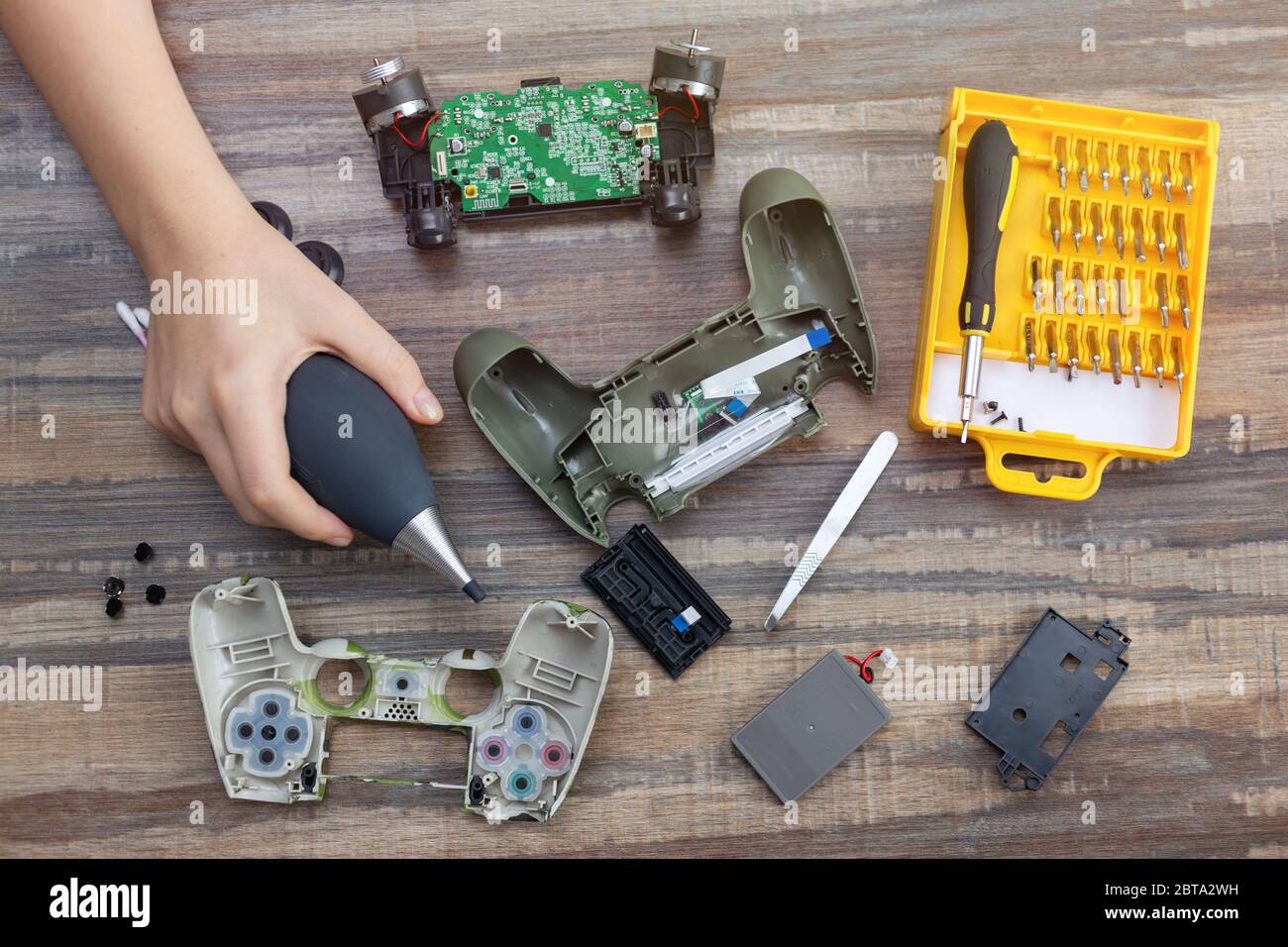 Toronto, Canada Mat, 23,2020 Flat lay of hand disassemble game