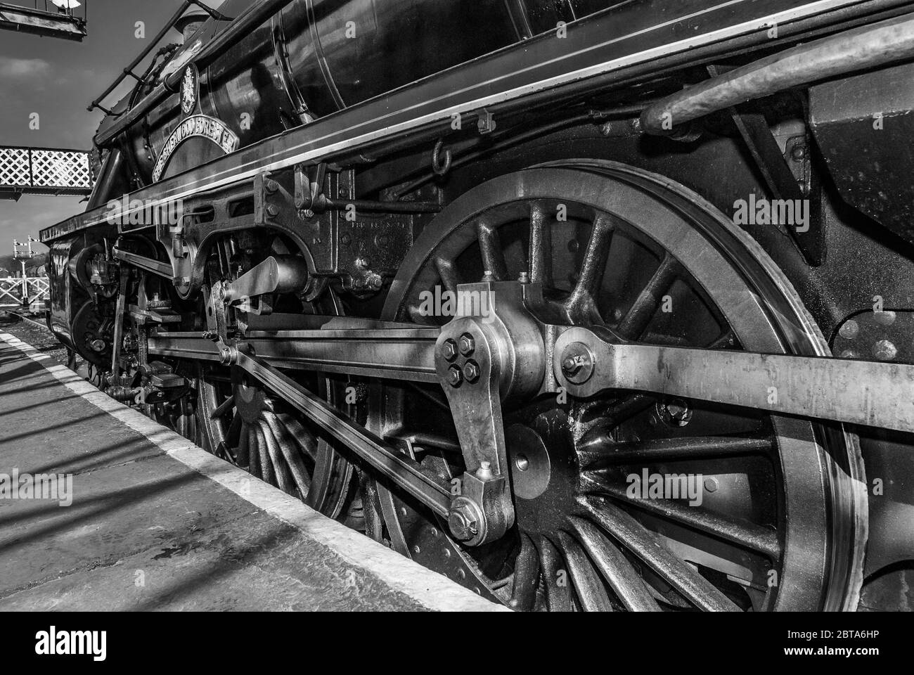 The massive driving wheels of the  L.M.R. 'Black 5' 4-6-0, steam locomotive No. 45231, 'The Sherwood Forester'. Pictured at Ramsbottom station on the Stock Photo