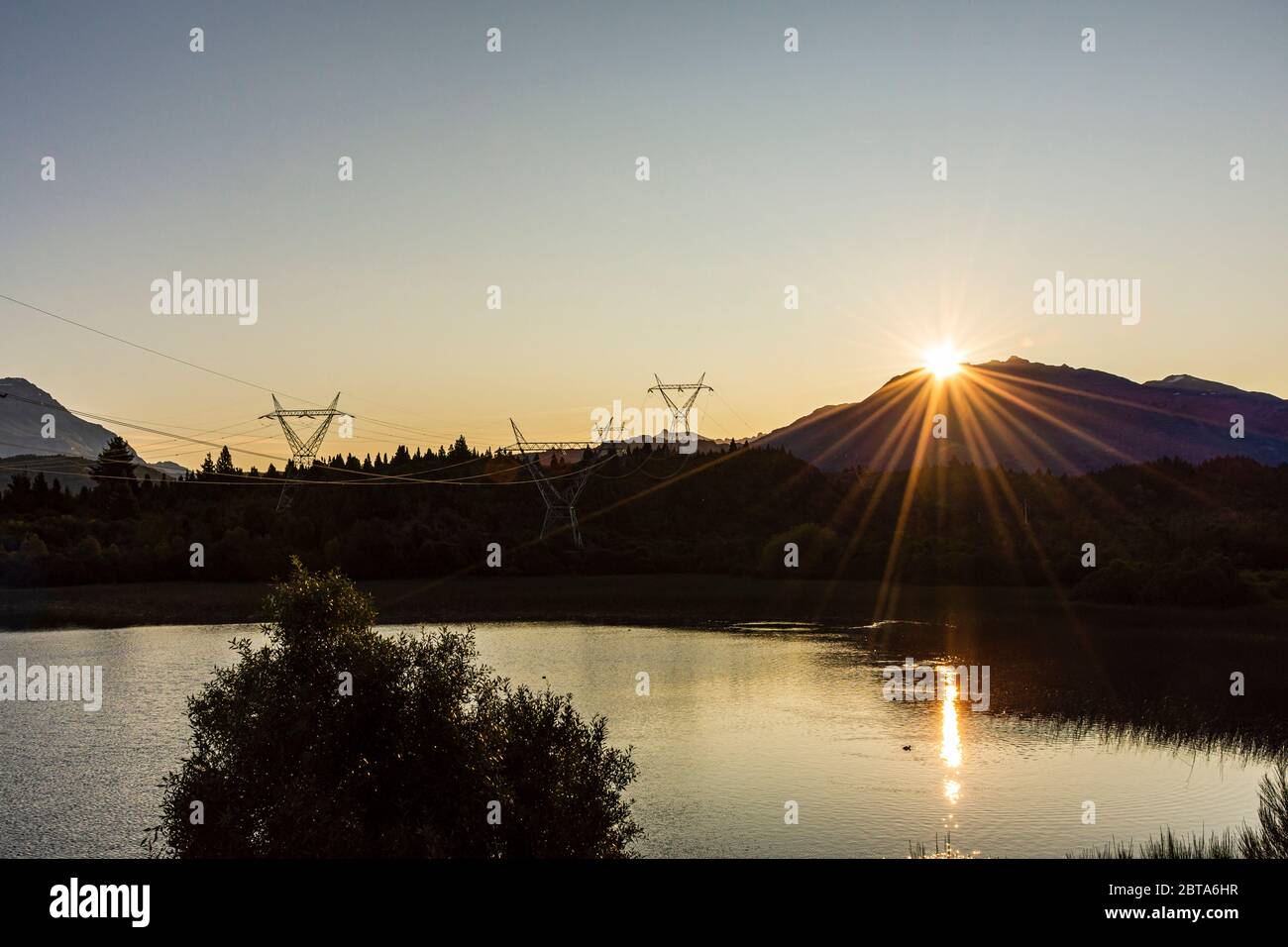 Scene view high voltage power lines silhouette at sunset Stock Photo ...