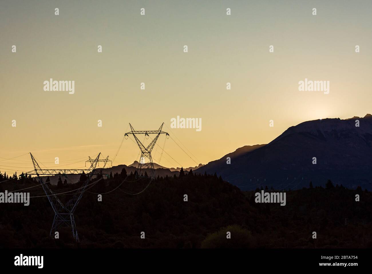 Scene view high voltage power lines silhouette at sunset Stock Photo ...