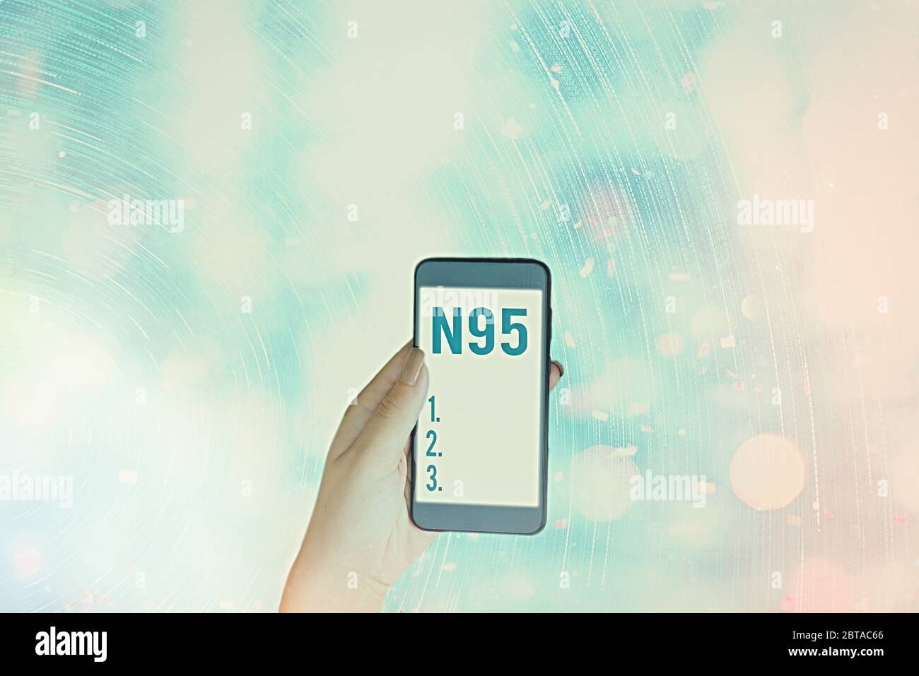 Conceptual hand writing showing N95. Concept meaning an individualal protective equipment that are used to protect the wearer Stock Photo